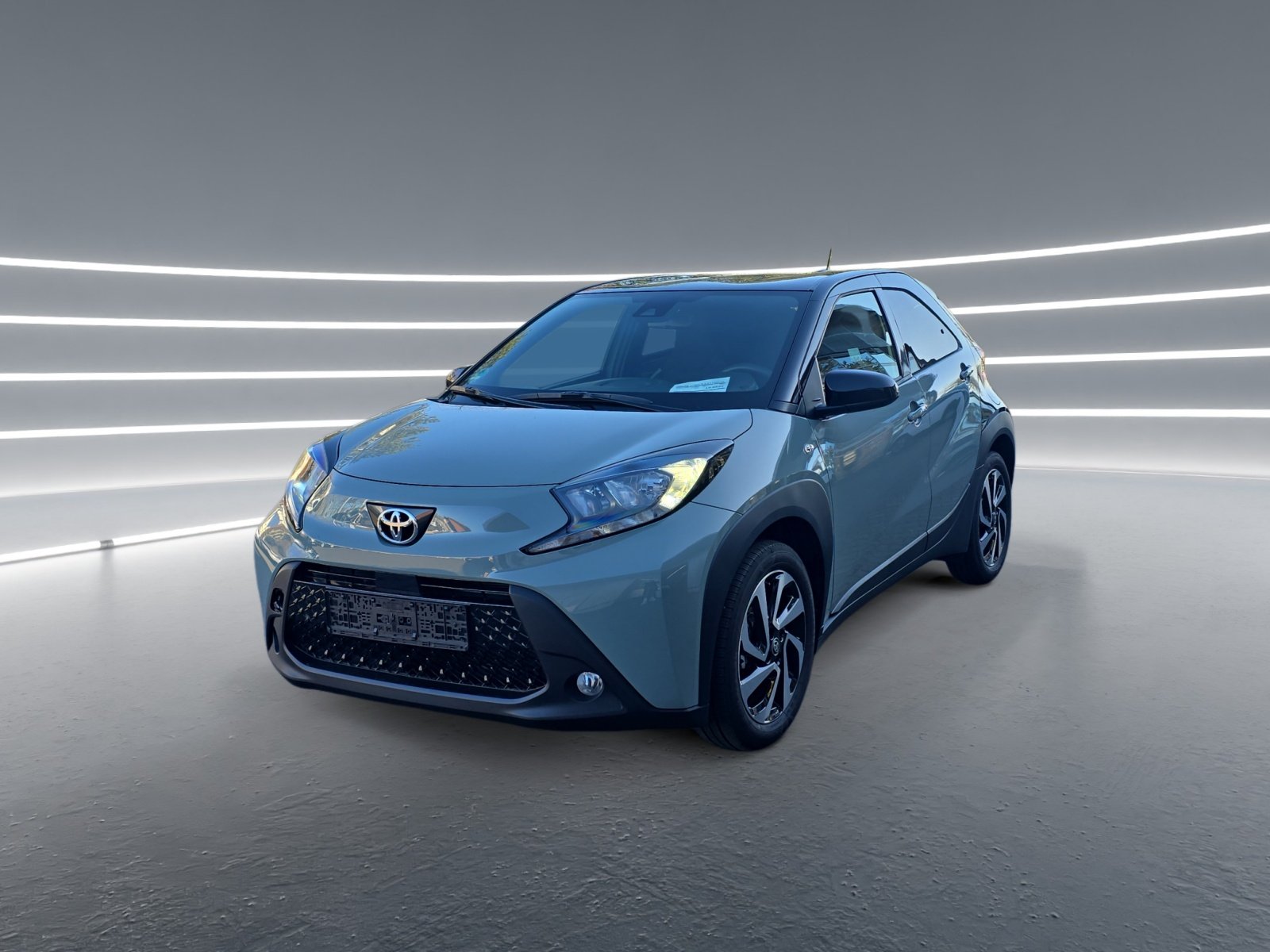 Foto 1 - Aygo X 1.0 l Team D *KAMERA*ACC*KLIMA*CarPlay*, Urban Khaki