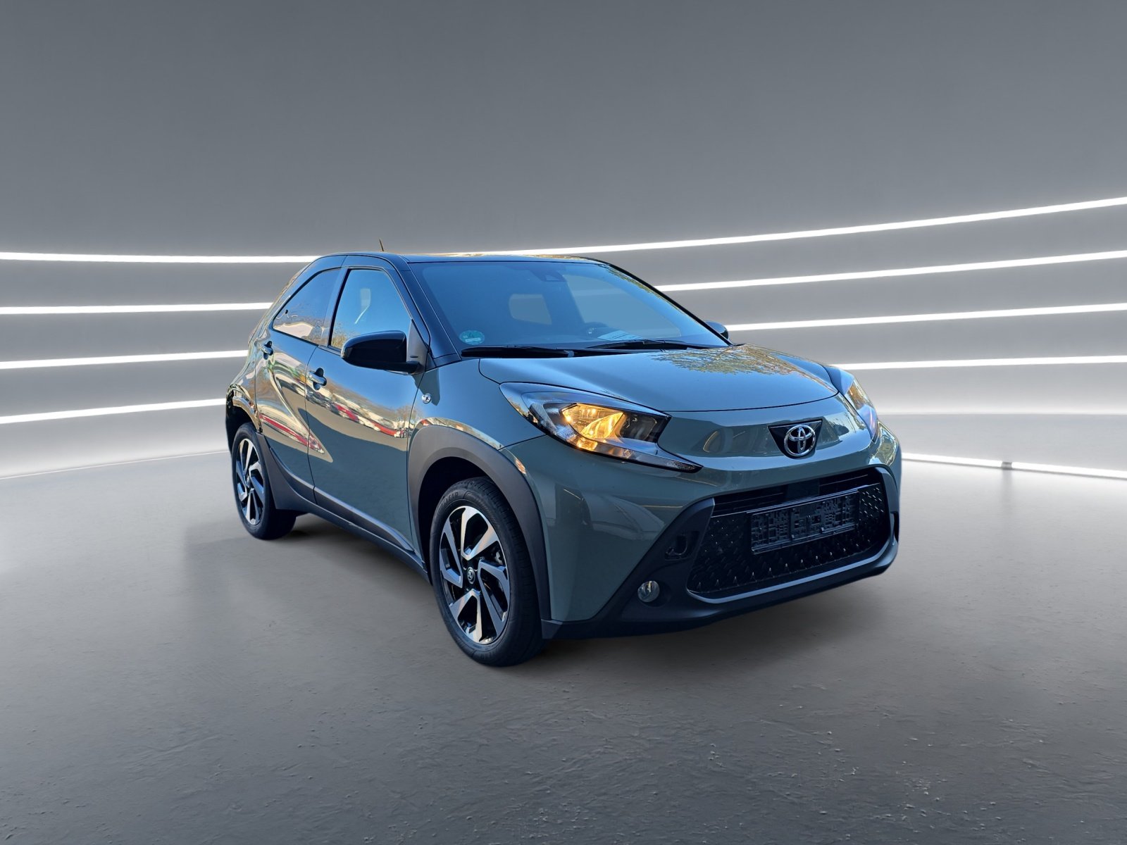 Foto 1 - Aygo X 1.0 l Team D *KAMERA*ACC*KLIMA*CarPlay*, Urban Khaki